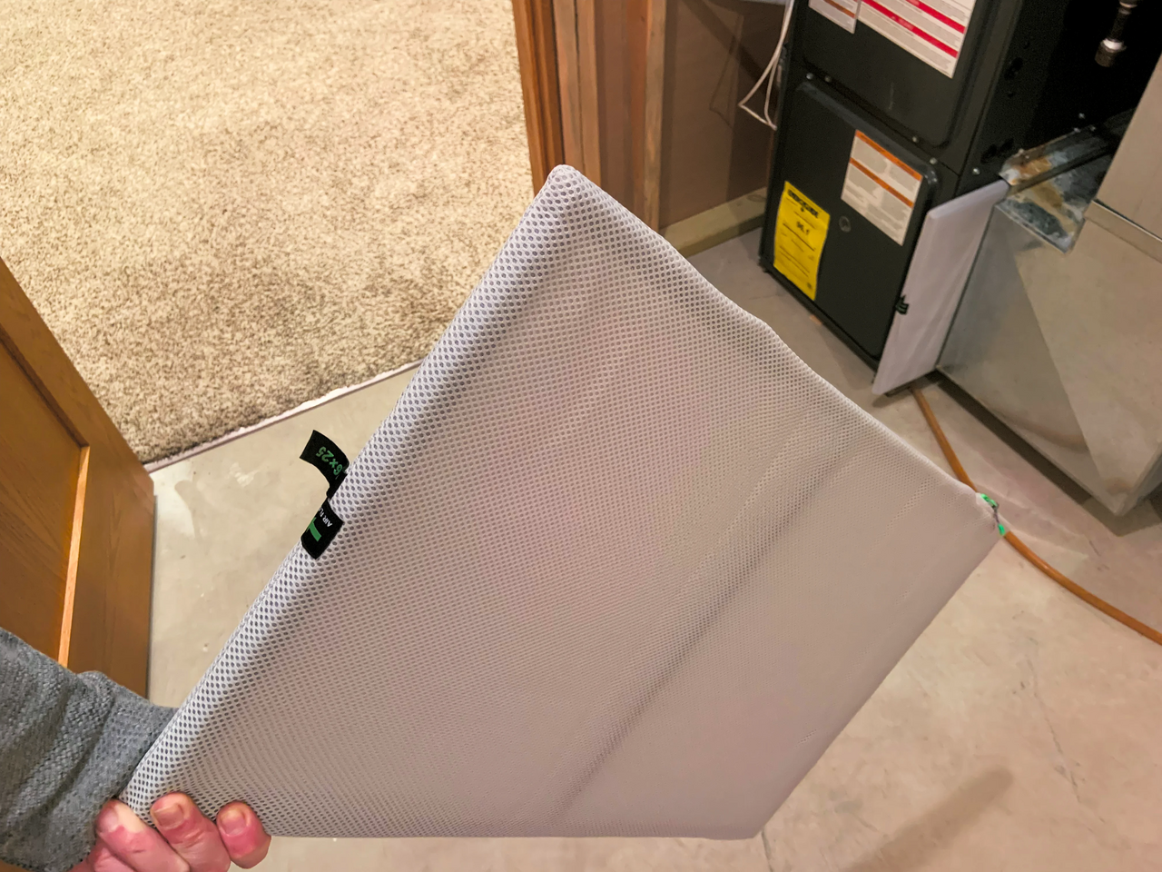 Reusable washable HVAC air filter with a visible mesh surface